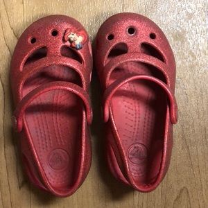 Girls Crocs sandals.